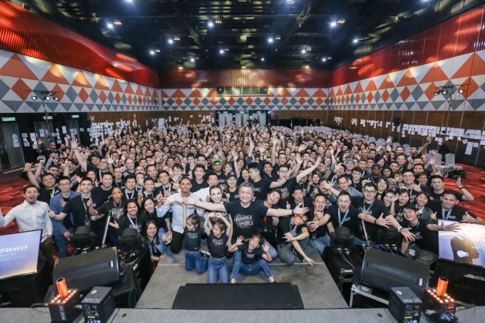Hundreds of attendees packed into a live event